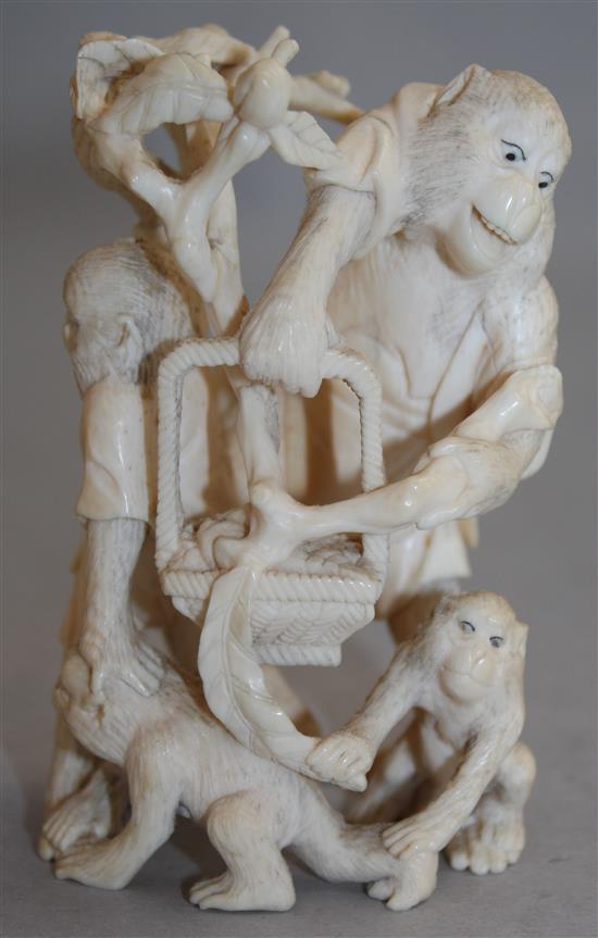 A Japanese carved ivory group of monkeys, Meiji period, 9.5cm